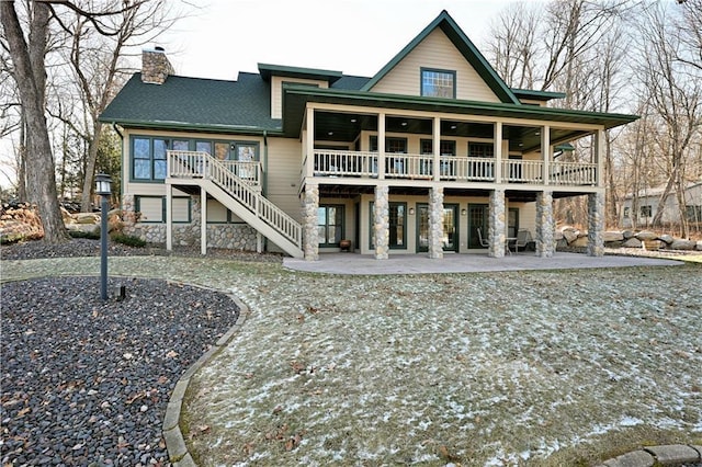 rear view of house with a patio