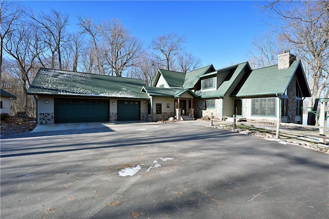 view of front of home with a garage