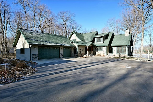 view of front of home with a garage