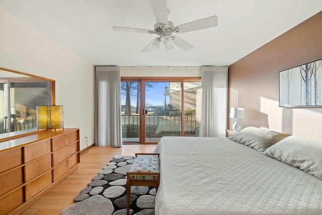 bedroom featuring light hardwood / wood-style flooring, access to outside, and ceiling fan