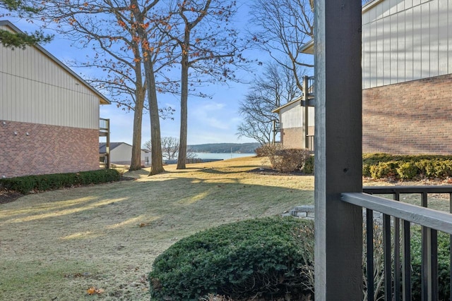 view of yard with a water view