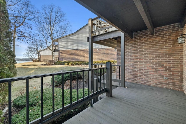 deck featuring a water view