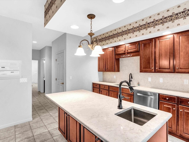 kitchen with tasteful backsplash, dishwasher, sink, hanging light fixtures, and light stone counters