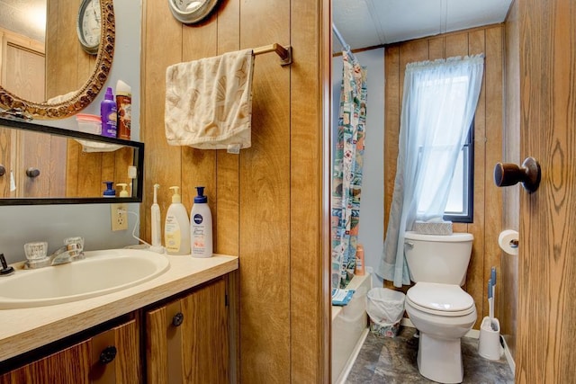 full bathroom with shower / bathtub combination with curtain, vanity, and toilet