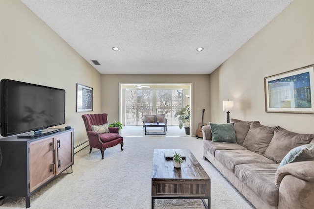 living room with a baseboard radiator, light carpet, and a textured ceiling