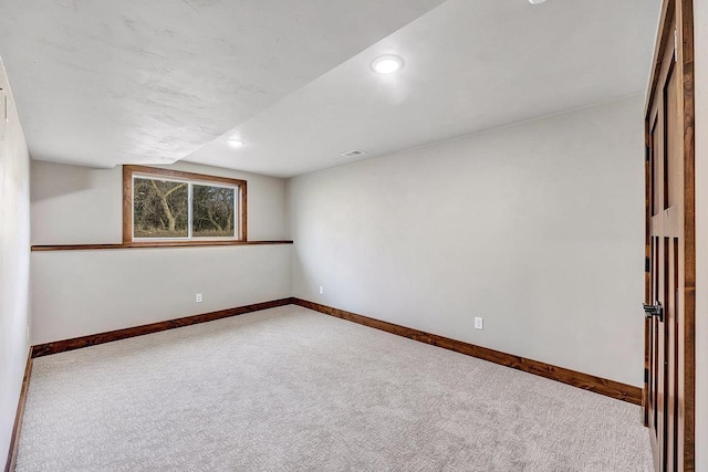 spare room with carpet flooring