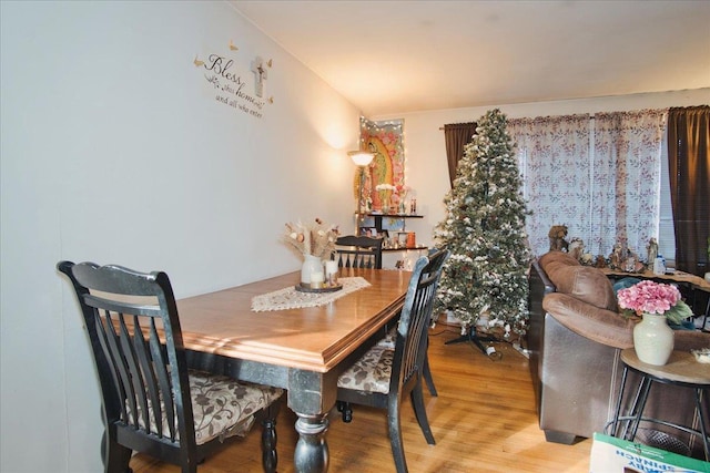 dining room with light hardwood / wood-style flooring