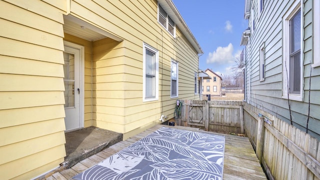 view of side of property featuring a deck