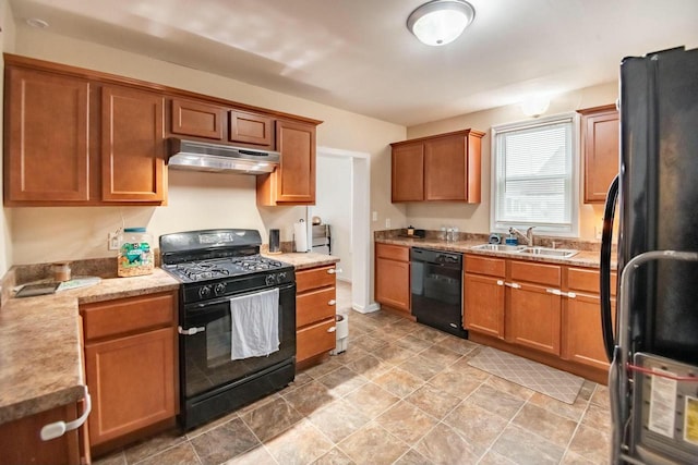 kitchen featuring sink and black appliances