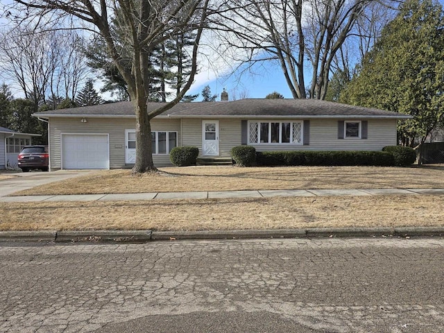 ranch-style home with a garage