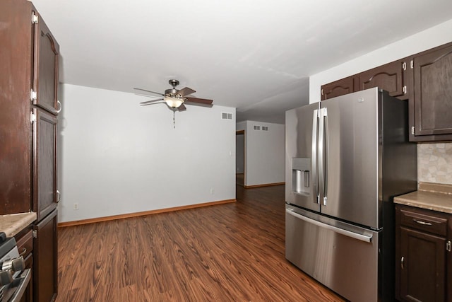 kitchen with tasteful backsplash, dark wood-type flooring, stainless steel appliances, and ceiling fan