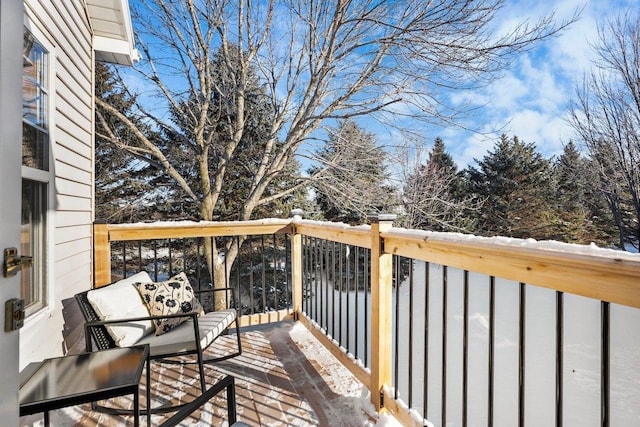 view of snow covered deck