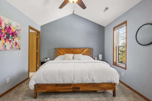 carpeted bedroom with ceiling fan and lofted ceiling