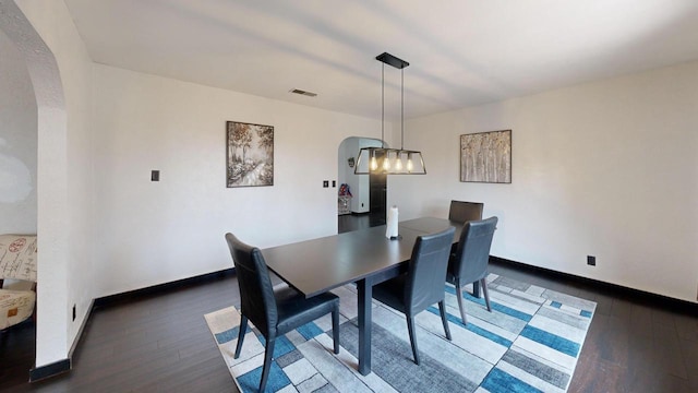 2930 Youngdale Ave, La Crosse, WI 54603 - dining space featuring dark wood-type flooring and an inviting chandelier