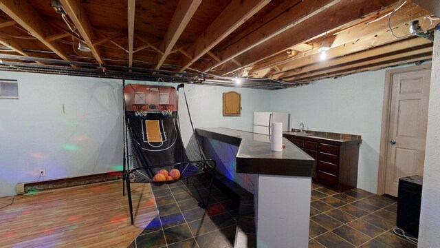2930 Youngdale Ave, La Crosse, WI 54603 - basement featuring white fridge and sink
