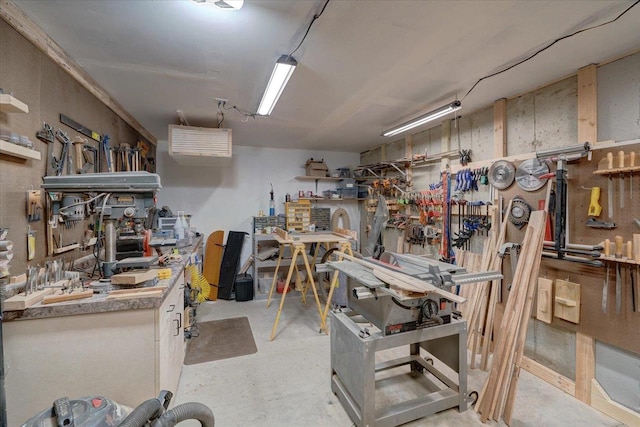 interior space featuring a workshop area