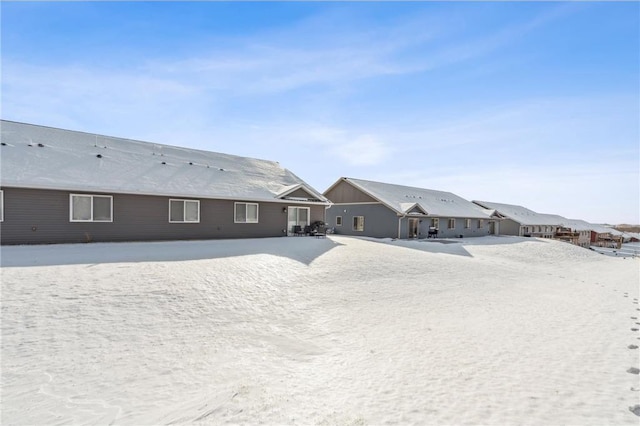 view of snow covered house