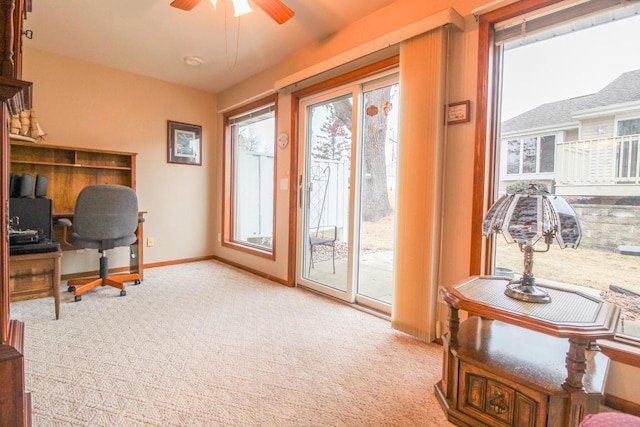 office area with light carpet and ceiling fan