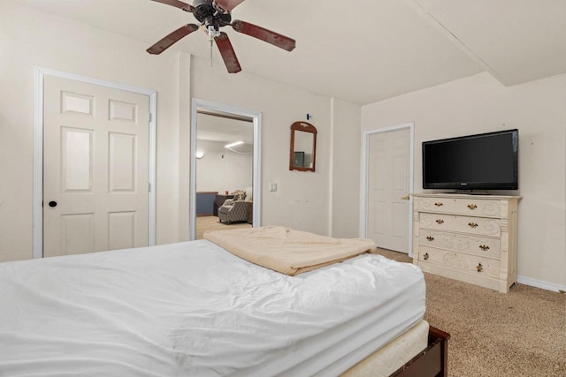 bedroom featuring ceiling fan and carpet flooring