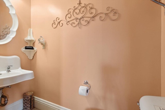 126 E Washington St, Stoughton, WI 53589 - half bathroom featuring toilet