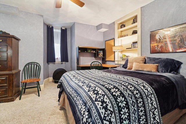 126 E Washington St, Stoughton, WI 53589 - carpeted bedroom featuring baseboards and a ceiling fan