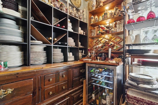 126 E Washington St, Stoughton, WI 53589 - wine room featuring wine cooler and a dry bar
