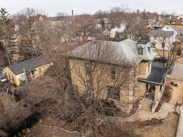 126 E Washington St, Stoughton, WI 53589 - view of side of home featuring a residential view