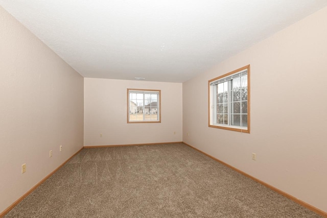 view of carpeted spare room