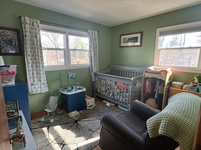 bedroom with multiple windows