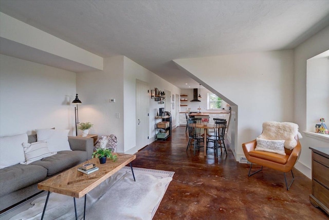 living room with a textured ceiling