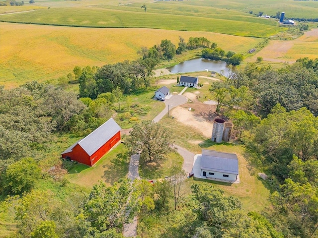 drone / aerial view with a rural view and a water view