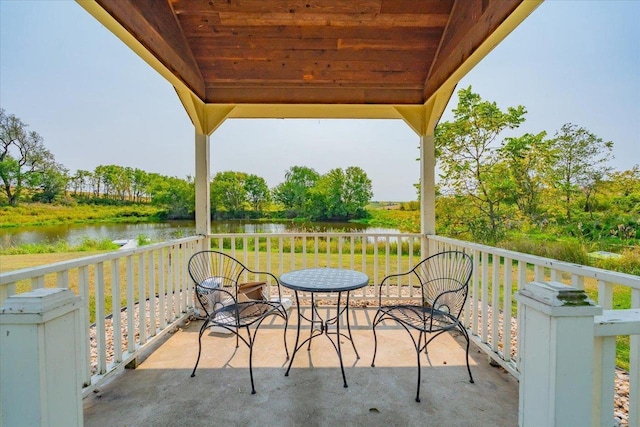 balcony featuring a water view