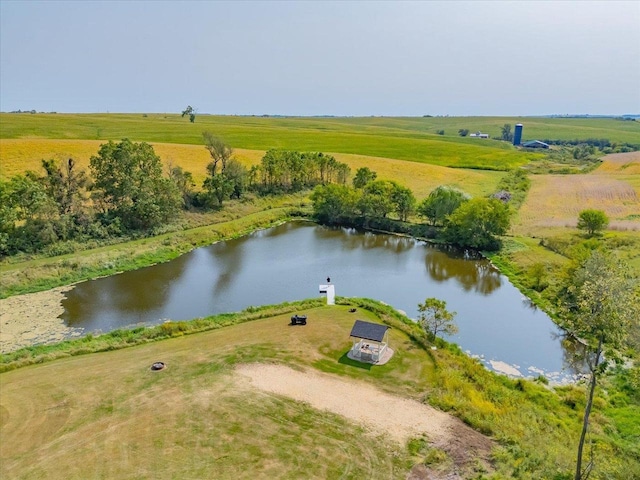 bird's eye view with a water view and a rural view