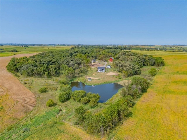 drone / aerial view featuring a water view and a rural view