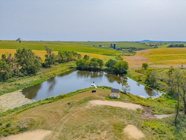 drone / aerial view with a rural view and a water view