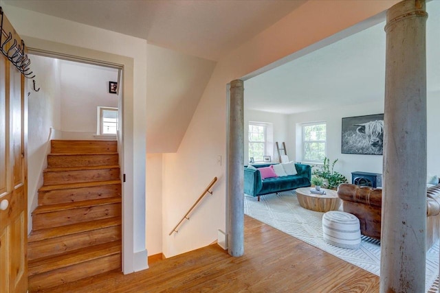 stairs with wood-type flooring