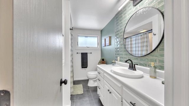 bathroom featuring tile patterned flooring, vanity, toilet, and a shower with shower curtain