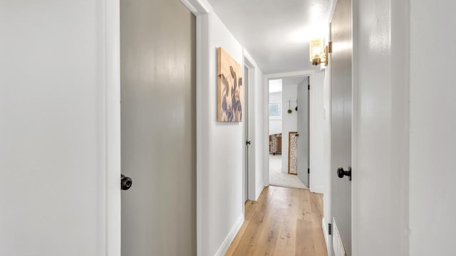 hallway featuring light wood-type flooring