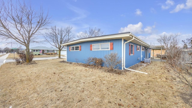 view of home's exterior with a yard