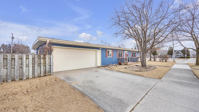 single story home featuring a garage