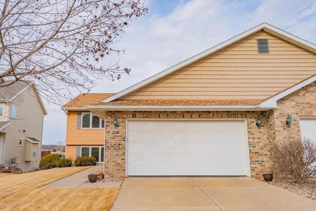 view of front of house with a garage