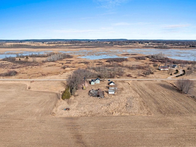 aerial view with a water view and a rural view