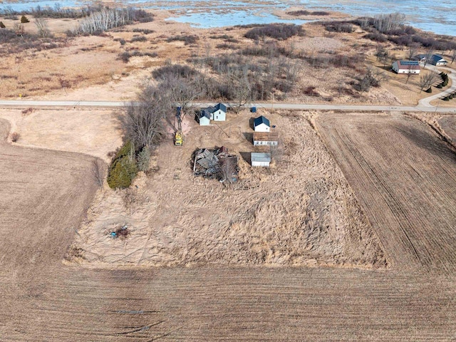 birds eye view of property featuring a rural view