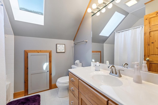 full bathroom featuring tile patterned flooring, vanity, vaulted ceiling with skylight, and toilet