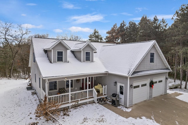 view of front of home featuring a garage and covered porch