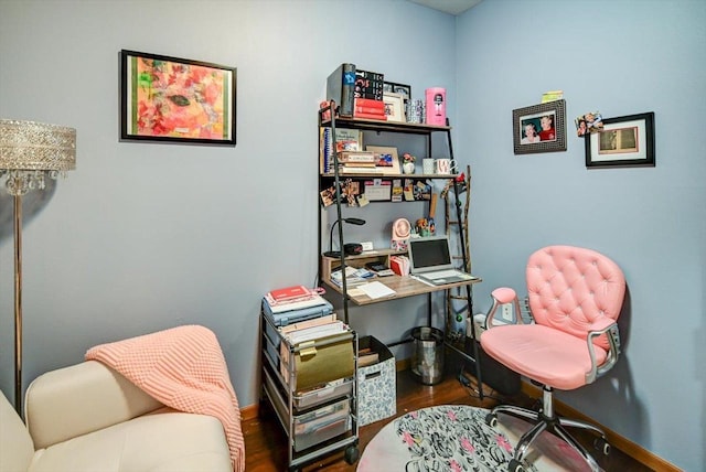 home office with hardwood / wood-style floors