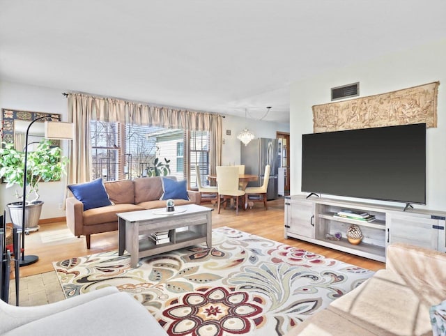 living room featuring light hardwood / wood-style floors