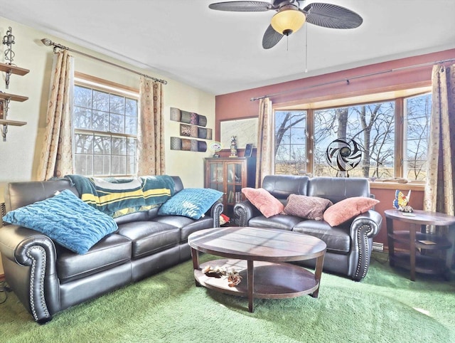 carpeted living room featuring ceiling fan