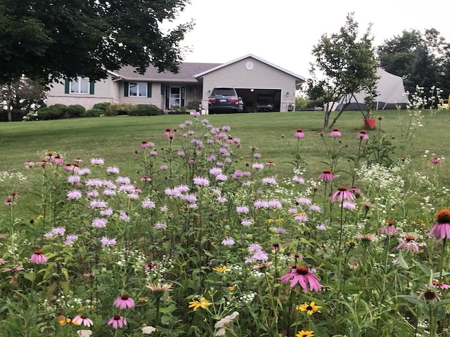 view of yard with a garage