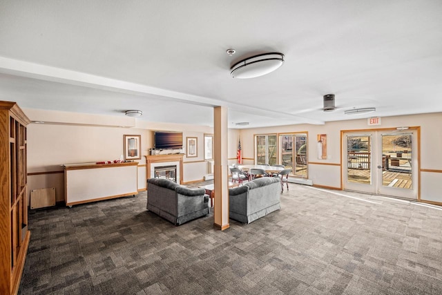 unfurnished living room featuring dark carpet